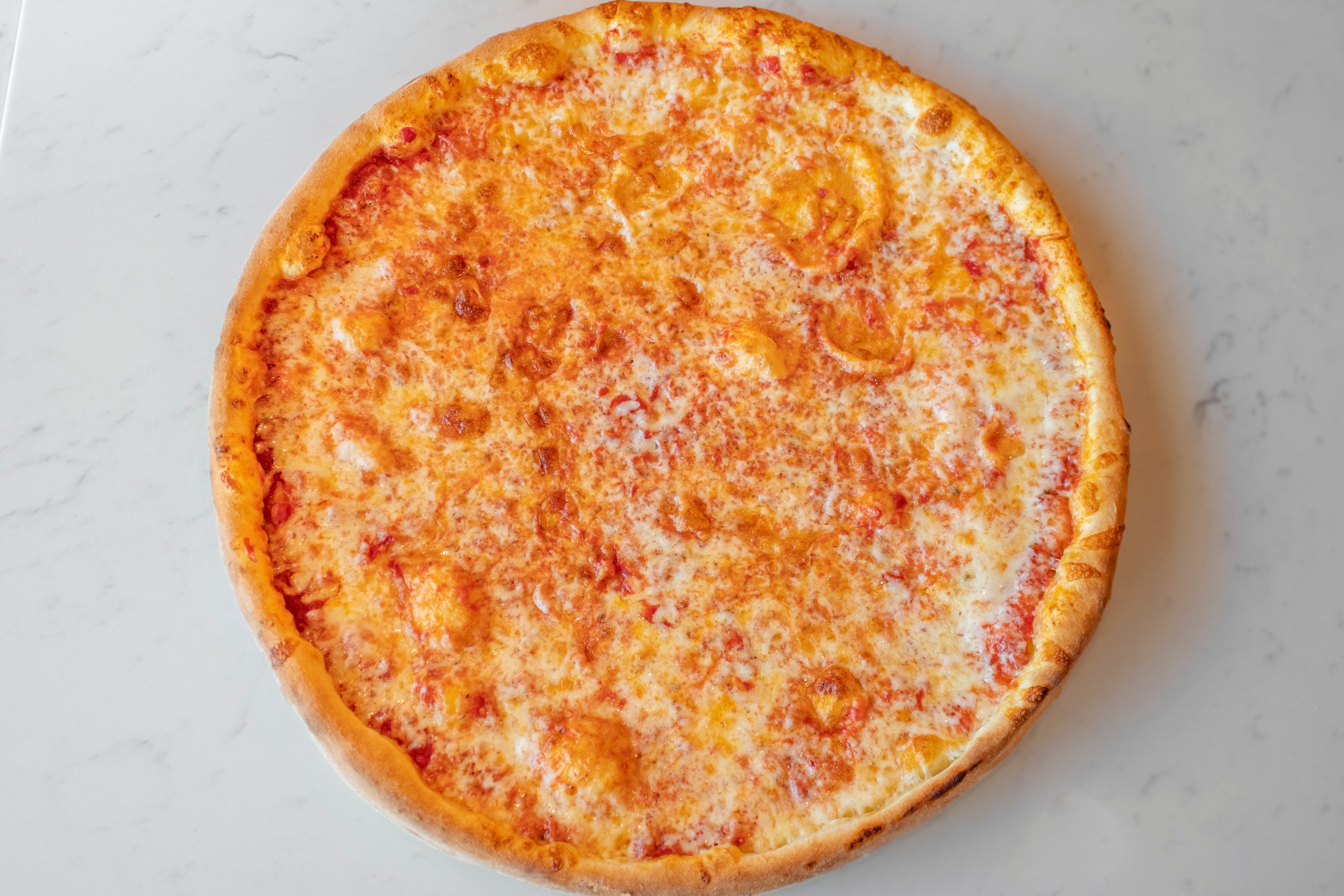 Overhead view of Pizza Mark famous cheese pizza